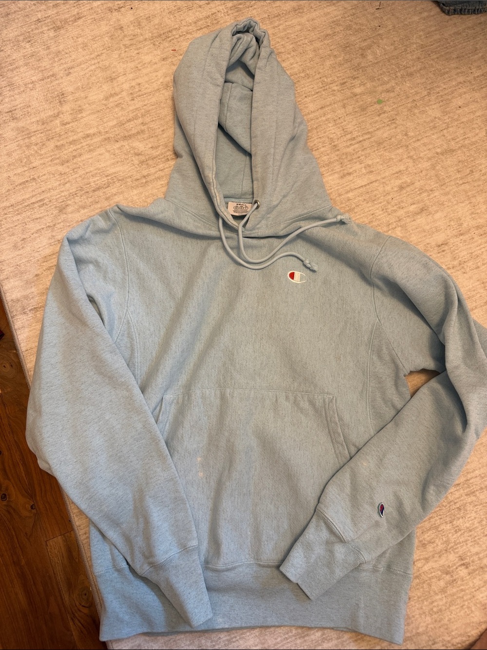 Champion Light Blue Pullover Hoodie with Embroidered Logo